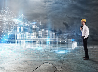 Businessman Architect analyzes a project of a building