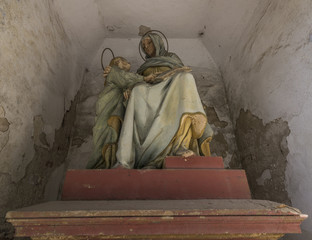 Statue of woman in Vysoke town in spring day