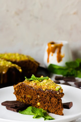 Chocolate cake with pistachios and salted caramel