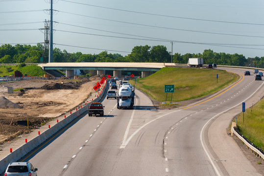 Diverging freeways with road construction at left