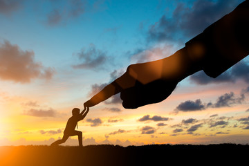 Silhouette Team business engineer work connecting jigsaw puzzle piece together. team responsible for the idea of progress over blurred natural.Teamwork potential and motivate employee growth concept