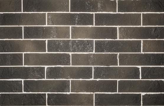 Brick wall of black brick