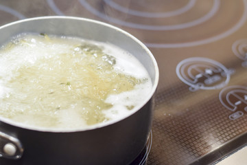 Spaghetti boiling in water