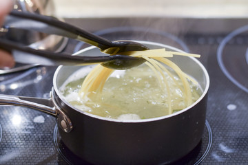 Spaghetti boiling in water