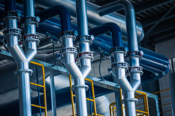 steel pipelines and cables in a plant,Industrial zone.