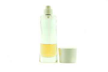 Perfume bottles with white light background. fragrance cosmetics, fragrance collection. Gold concept. Free space for text on the side