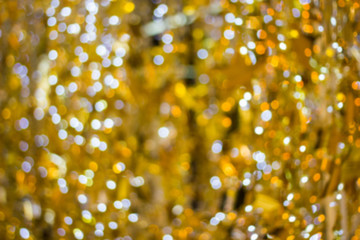 Blur - bokeh Decorative outdoor string lights hanging on tree in the garden at night time - decorative christmas lights - happy new yea