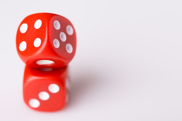 Red dice on white background