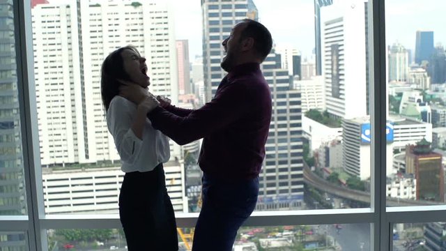 Husband murdering his wife by window at home, super slow motion 240fps