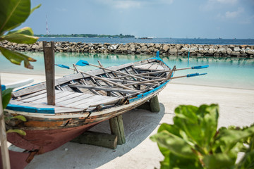 Boat on the shore of the city of Male. Maldives. Vacation. White sand.