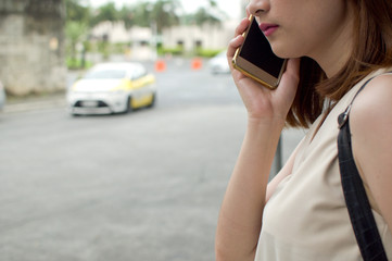 A woman waiting for uber