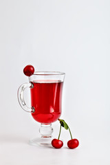 Delicious cherry juice and ripe cherries.