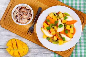 pear, kiwi, apricot,mango and peach salad