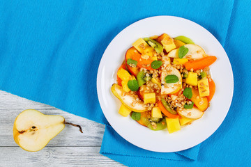 pear, kiwi, apricot, mango and peach salad