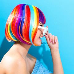 Beautiful woman in a colorful wig