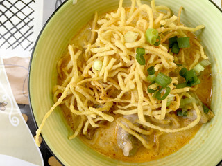 Thai spicy food, Egg noodle in chicken curry or name in thai is khao soi kai. local cuisine North of Thailand.
