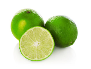 Naklejka na ściany i meble Limes on white background