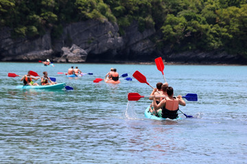 Tourists enjoy kayaking in the sea, Koh Samui, Thailand June 11 2017. 