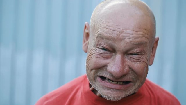 Drunk man making funny face