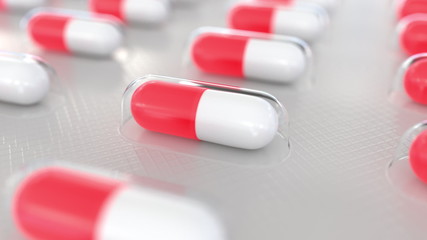 Red and white drug capsules in blister pack macro 3D rendering