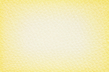 Closeup surface of yellow leather of sofa texture background