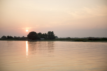 Breathtaking sunset in Danube Delta, Romania, in a summer day