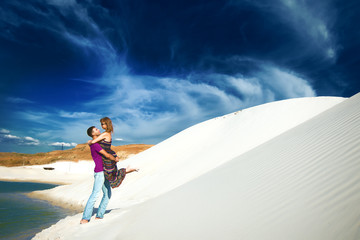 lovers playing on beach