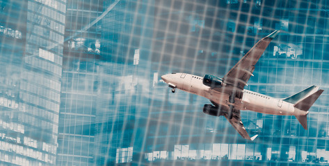 Fototapeta na wymiar Airliner in motion on abstract background