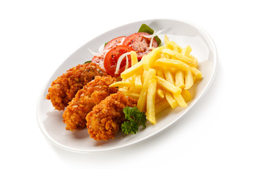 Fried chicken nuggets and vegetables 