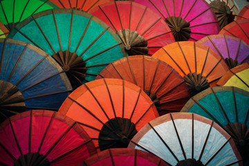 Colorful traditional paper umbrellas on market. Laos, Luang Prabang