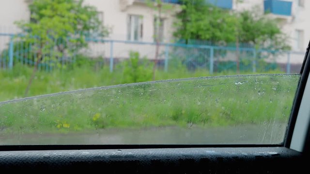 Rain drops behind the glass auto. 4K