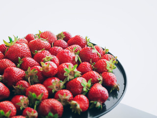 Fresh, ripe, juicy strawberries. Appetizing berries with droplets on a tray