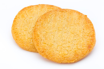Stacked short pastry cookies isolated on white background.