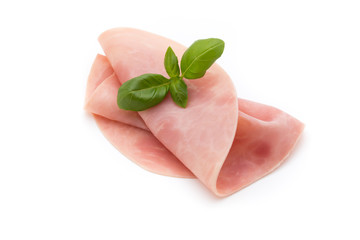 Thin slices of ham on white background.