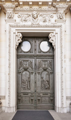 Beautiful antique carved wooden door. Entrance to the Berlin Cathedral, Museum Island, Germany.