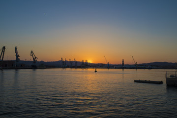 Naklejka premium Sunset in the port