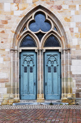 Fototapeta premium Arched beautiful gothic door of the City Temple in Esslingen, Baden-Wurttemberg, Germany.