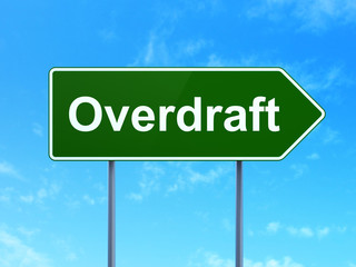 Finance concept: Overdraft on road sign background