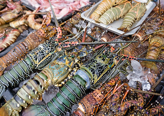 Fresh lobster and other seafood sold at night market in Kota Kinabalu, Sabah Borneo, Malaysia.