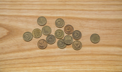 Old soviet coins on a wooden background