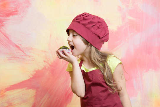 kid, happy girl cook in red chef hat, apron