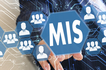 The businessman clicked the button MIS, Management Information System on the touch screen with a...