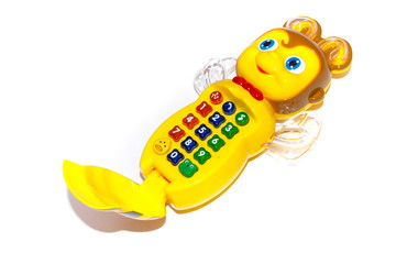 Musical baby toy phone on a white background . The toy runs on batteries
