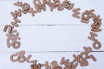 Wooden alphabet on white background