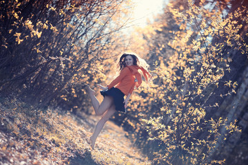 girl happy autumn park