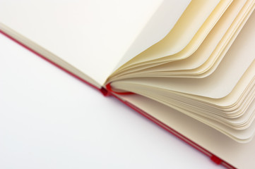 Red open notepad with sheets macro, angle copy-space