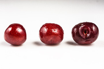 Ripe juicy sweet cherries isolated on white background