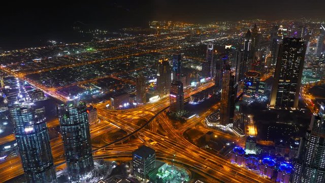 Busy traffic scene in the rush hour on Sheikh Zayed Road, Dubai's main road artery, night time lapse, 4k