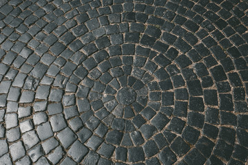 Texture of old stone pavement tiles cobblestones bricks, pattern, background