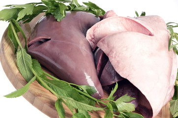 Fresh black and white liver lamb, spices, close-up..